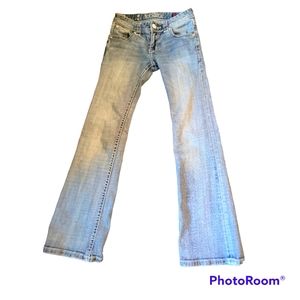 Lightly worn girls rock and roll jeans, please read description.